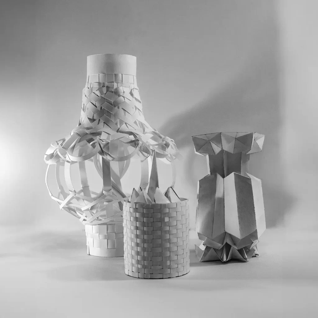 The Elysian Family are 5 sculptures made of paper inspired by Richard Serra's 1967 "Verb List" concept.